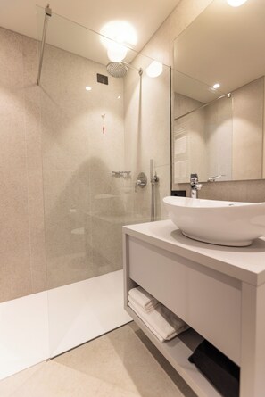 Suite, Lake View | Bathroom | Shower, hair dryer, towels, soap - LLAC Living Nature Hotel (Limone sul Garda)