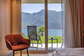 Superior Double Room, Patio, Lake View | In-room safe, free WiFi - LLAC Living Nature Hotel (Limone sul Garda)