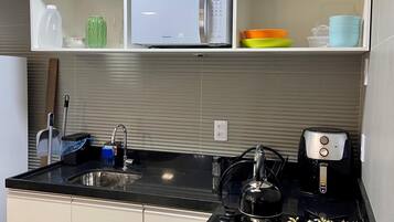 Deluxe Apartment, Garden View | Private kitchen | Fridge, microwave, stovetop, cookware/dishes/utensils