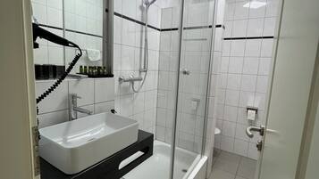Hair dryer, towels, soap, toilet paper