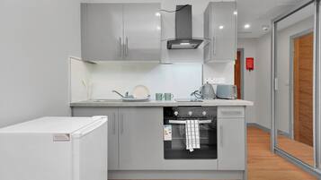 Apartment | Private kitchen | Fridge, oven, stovetop, electric kettle