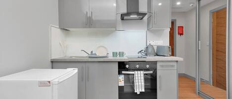 Apartment | Private kitchen | Fridge, oven, stovetop, electric kettle