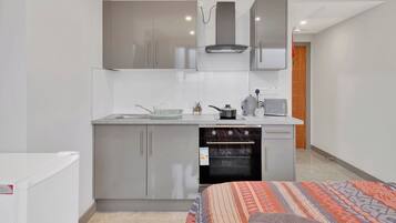 Apartment | Private kitchen | Fridge, oven, stovetop, electric kettle