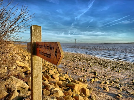 Beach. Stylish cottage in vibrant riverside village