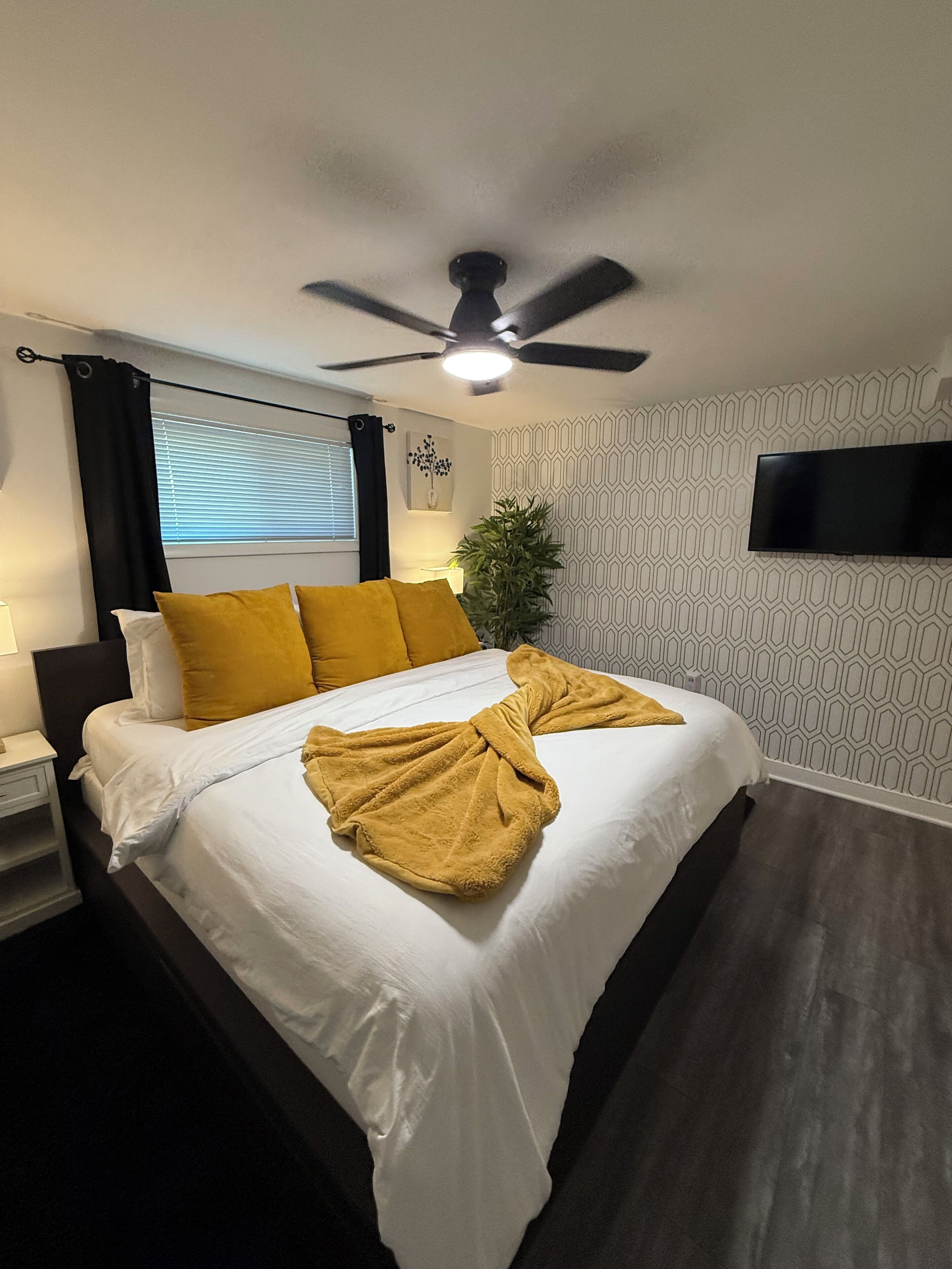 1 bedroom, desk, iron/ironing board, travel crib