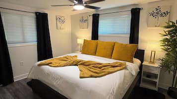 1 bedroom, desk, iron/ironing board, travel crib