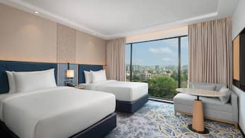 Habitación, 2 camas individuales | Minibar, cunas gratuitas, wifi gratis y ropa de cama