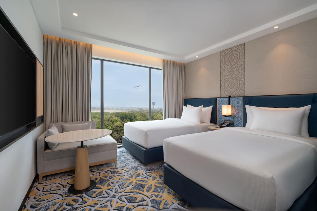 Room, 2 Twin Beds (Runway View) | Minibar, free cribs/infant beds, free WiFi, bed sheets