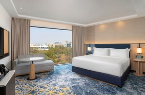 Habitación Deluxe, 1 cama de matrimonio grande, vistas a la ciudad | Minibar, cunas gratuitas, wifi gratis y ropa de cama