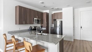 Fridge, dining tables - Landing at The Draper - 1 Bedroom in Garland (Garland)