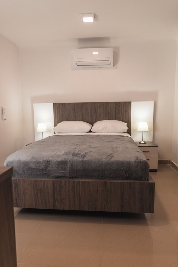 1 habitación, tabla de planchar con plancha, wifi y ropa de cama 