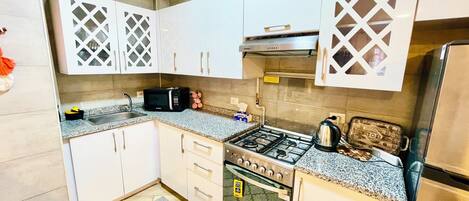 Fridge, microwave, oven, stovetop