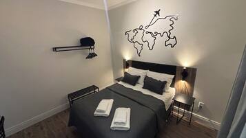 1 dormitorio, tabla de planchar con plancha, wifi gratis y ropa de cama