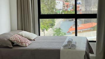 Laptop workspace, blackout curtains, free WiFi