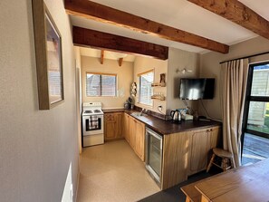 Fridge, microwave, toaster, cookware/dishes/utensils