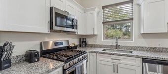 NEW! Scenic Golf Retreat with Modern Comforts & Fireplace
