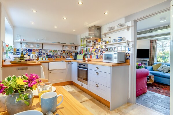 Fridge, microwave, oven, cookware/dishes/utensils
