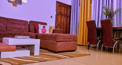 Bright, cozy apartment, where mustard yellow creates a warm ambience.