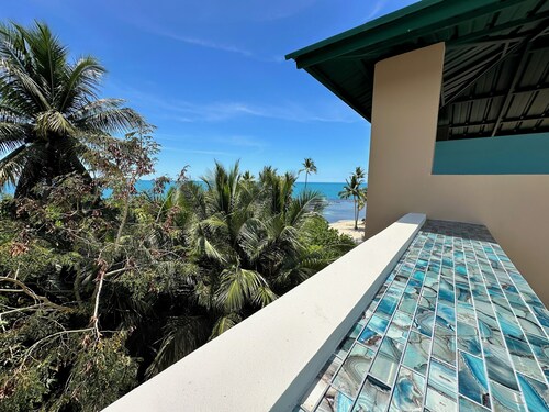 Serenity by the Sea – 3BR Penthouse with Semi-Private Beach, WiFi, full A/C