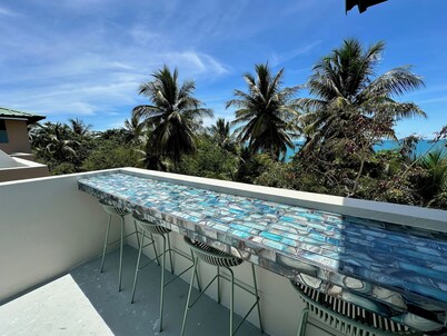 Serenity by the Sea – 3BR Penthouse with Semi-Private Beach, WiFi, full A/C