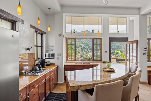 Fridge, microwave, stovetop, coffee/tea maker