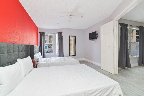 1 bedroom, desk, iron/ironing board, travel crib