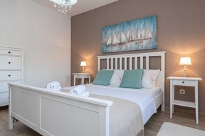 2 quartos, ferros/tábuas de passar roupa, Wi-Fi de cortesia