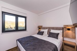 1 habitación, tabla de planchar con plancha, wifi gratis y ropa de cama 