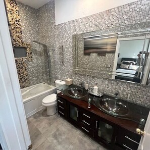 Jetted tub, hair dryer, towels, soap