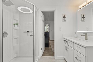 Shower, hair dryer, towels