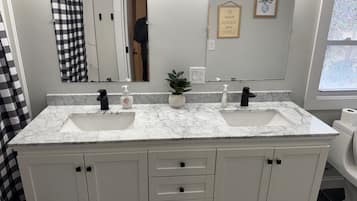 Hair dryer, towels, soap, shampoo
