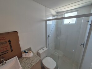 Shower, towels, soap, toilet paper