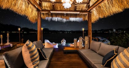 Waterfront w/ Beach Htd Pool Cinema Game Room Tiki