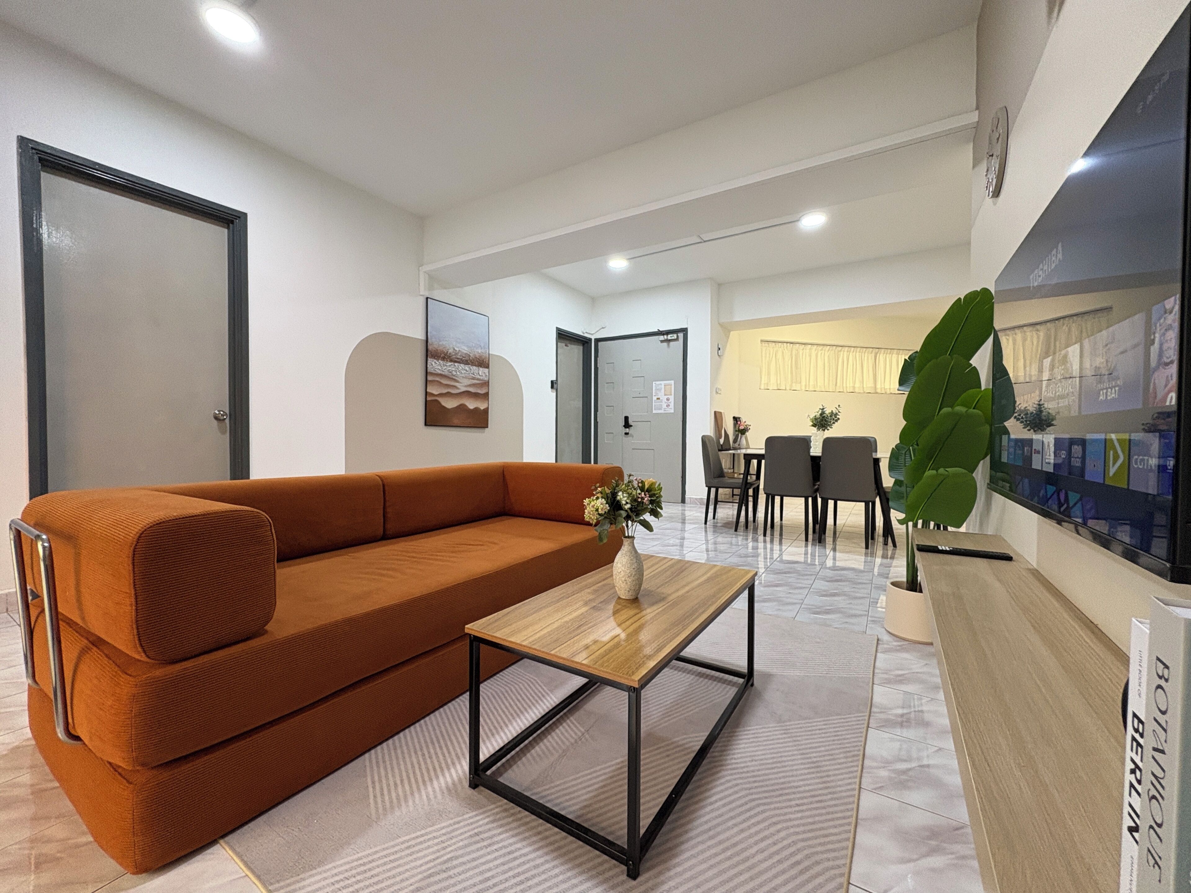Apartamento, 4 quartos | Área de estar