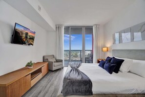 1 dormitorio, tabla de planchar con plancha, cuna de viaje y Internet