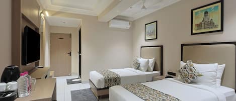 Hypo-allergenic bedding, minibar, desk, rollaway beds
