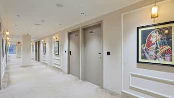 Superior Double Room, City View | Living area | 55-inch LED TV with cable channels, printers