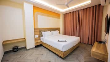 Deluxe Double Room, Mountain View | In-room safe, blackout drapes, soundproofing, iron/ironing board