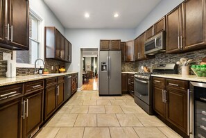 Fridge, microwave, oven, stovetop - **HostWise Stays** Rooftop Deck | Off-Street Parking | Prime Location! (Pittsburgh)