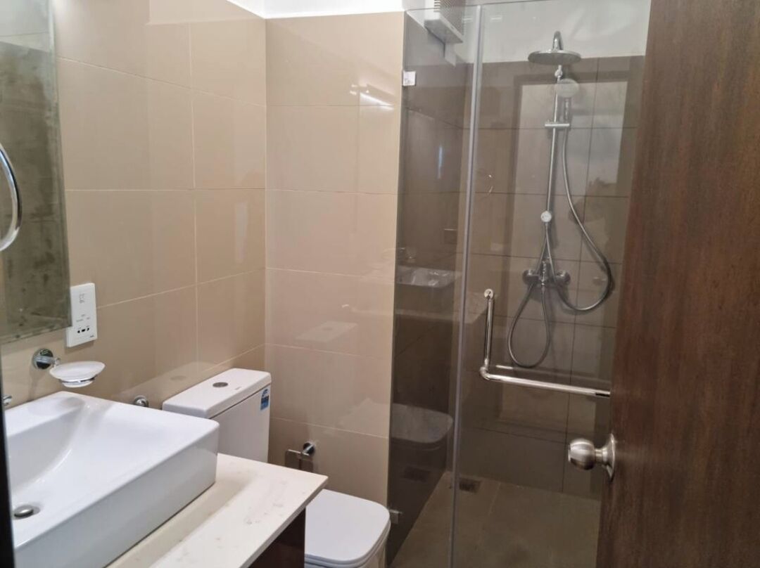 Shower, towels, soap, toilet paper