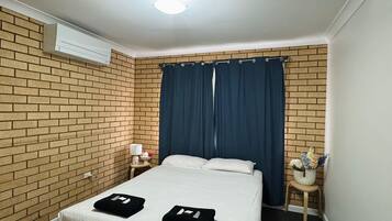 Laptop workspace, free WiFi, bed sheets