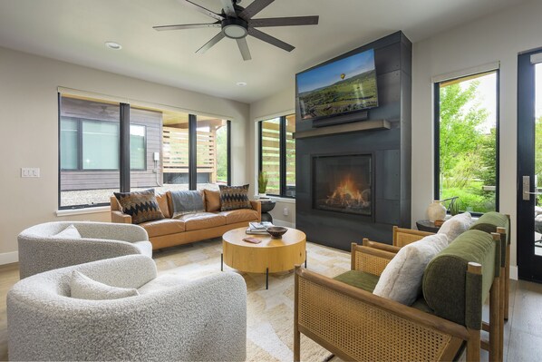 Smart TV, fireplace, table tennis, books