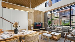 A modern living room with a wooden ceiling, a large TV, a sofa, and a dining area with a table set for two.