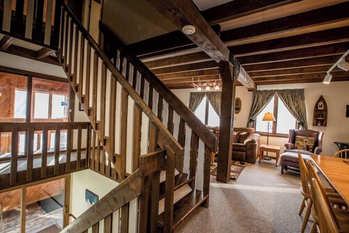 A Wonderful Vacation Home Set in the Woods with Unique Envelope Architecture