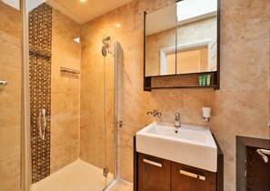 Hair dryer, towels, soap, shampoo