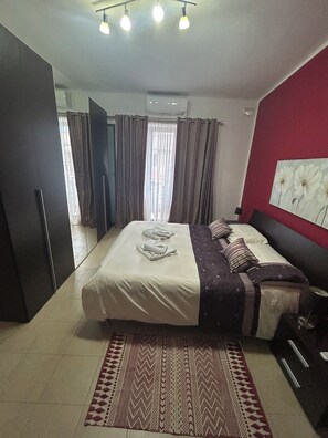 2 habitaciones, tabla de planchar con plancha y wifi gratis 