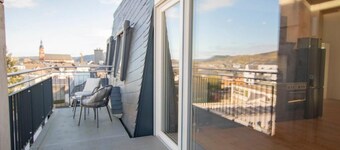 Penthouse apartment above the rooftops of Trier