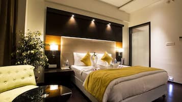 Premium Suite, City View | 1 bedroom, desk, laptop workspace, blackout drapes