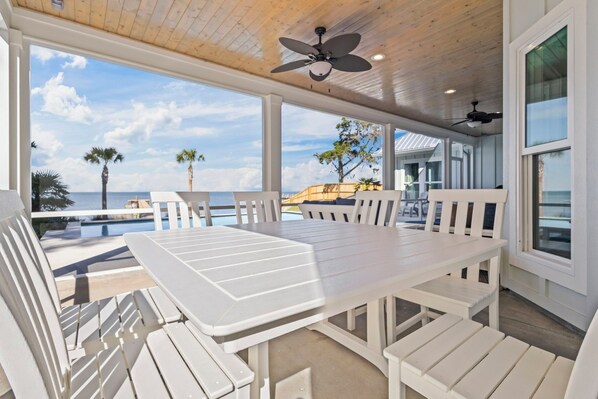 Outdoor dining - Gorgeous, New 5 Bdr/4+ ba Bay Front Home. Private Pool, Pier, Close Beach Access (Gulf Shores)