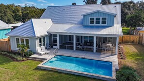 Outdoor pool, a heated pool - Gorgeous, New 5 Bdr/4+ ba Bay Front Home. Private Pool, Pier, Close Beach Access (Gulf Shores)